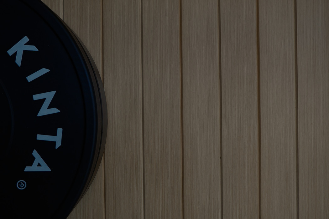 A bumper plate against the lined wall of a crgo unit